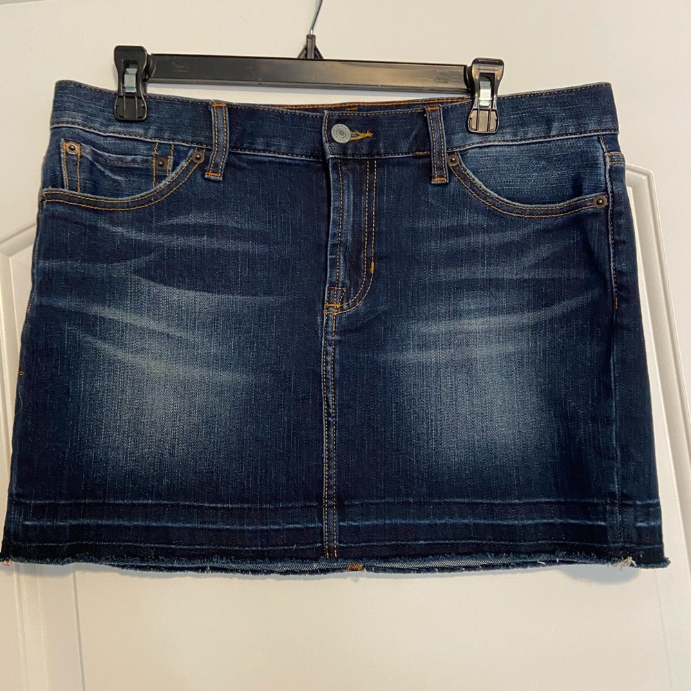 Trendy denim skirt by Jean Shop. Size 29.